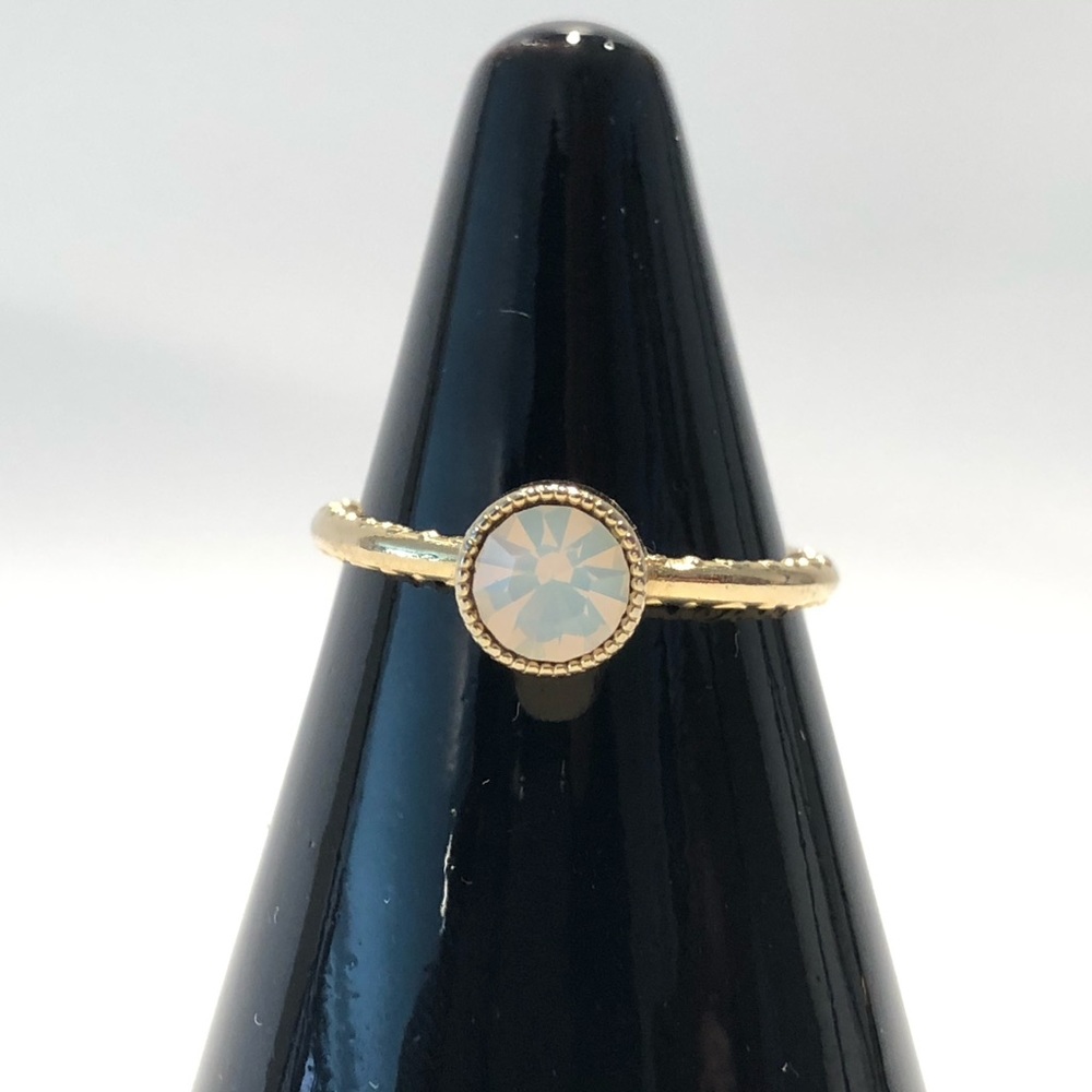 Gold tone crystal ring